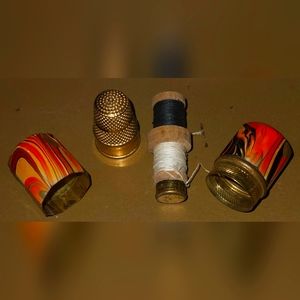 Vintage enamel on brass sewing kit